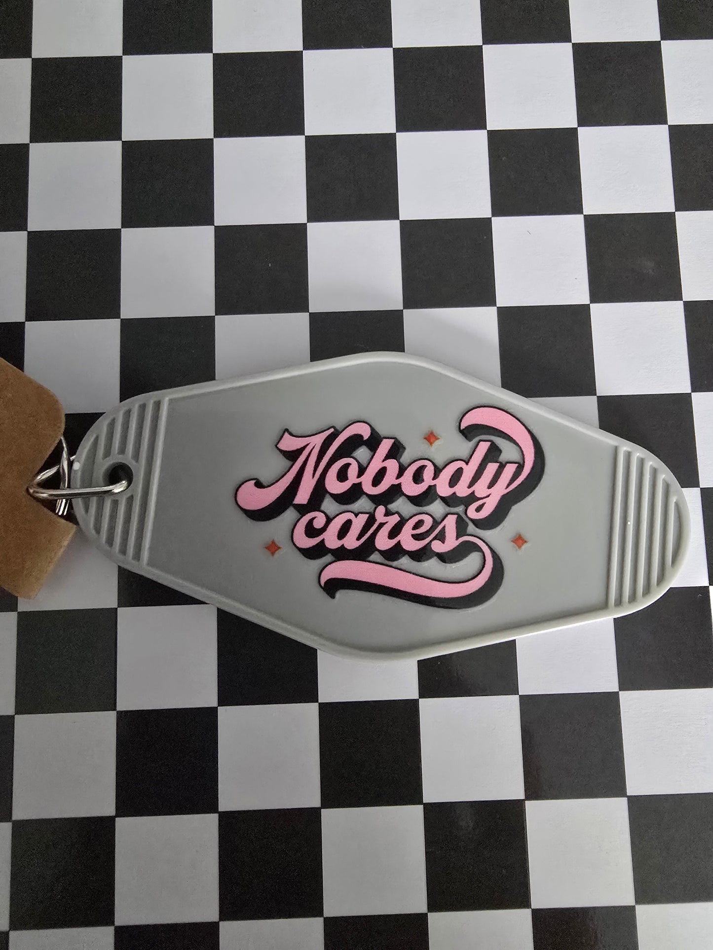 Nobody Cares Motel Keychain