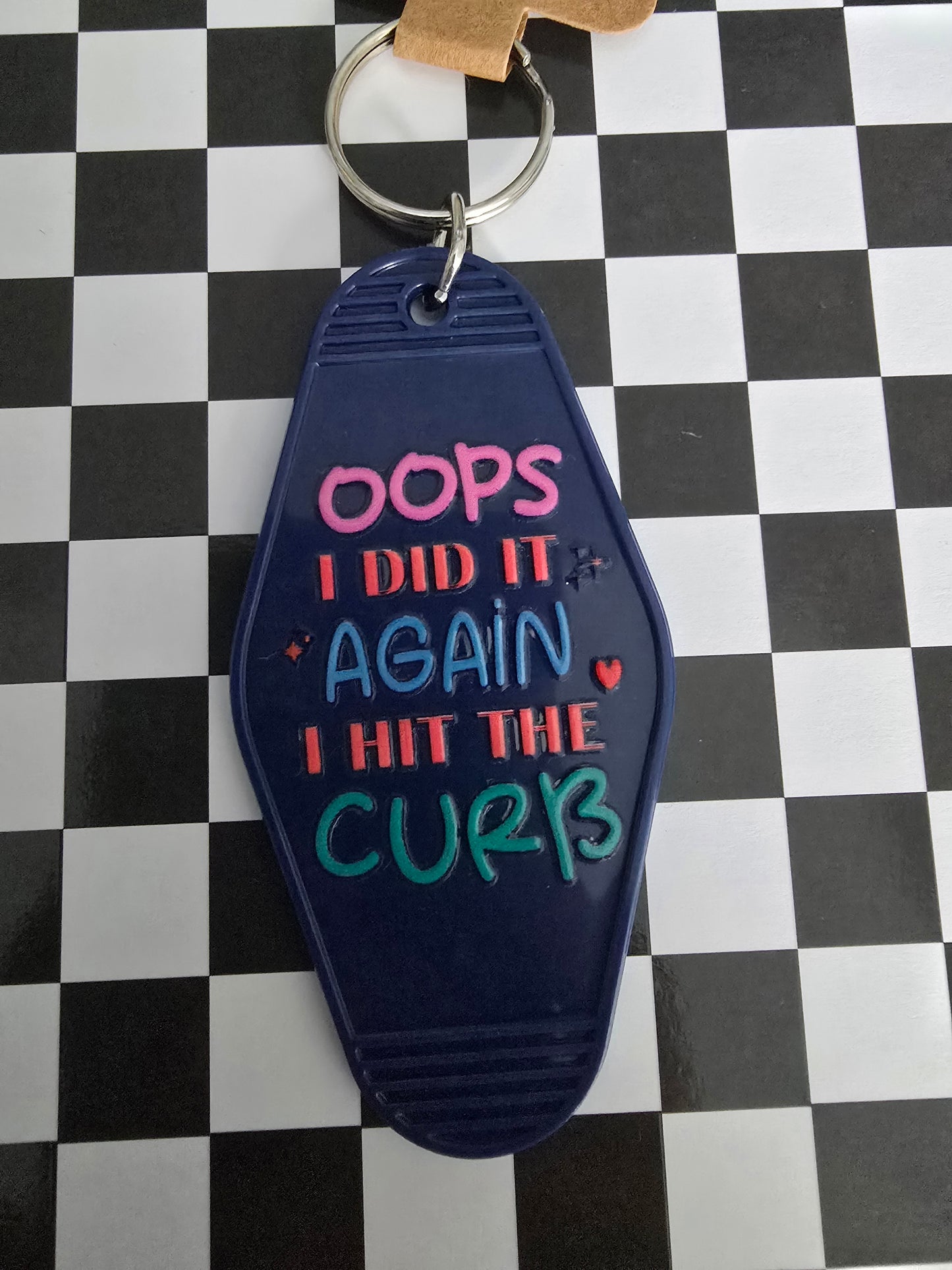 Oops I Hit the Curb Motel Keychain