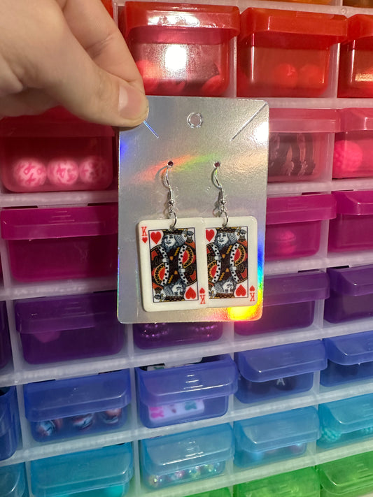 King playing earrings