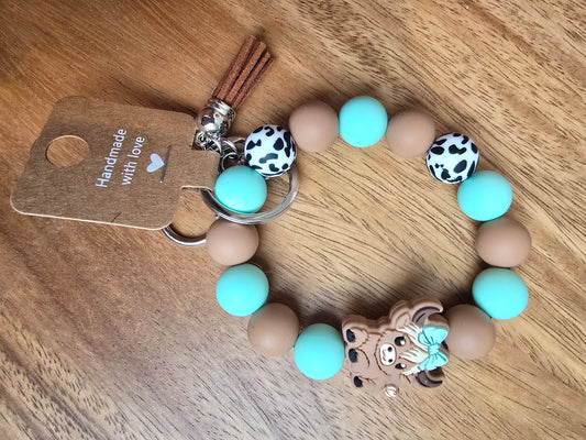 Coquette Cow Wristlet Keychain, Teal Silicone